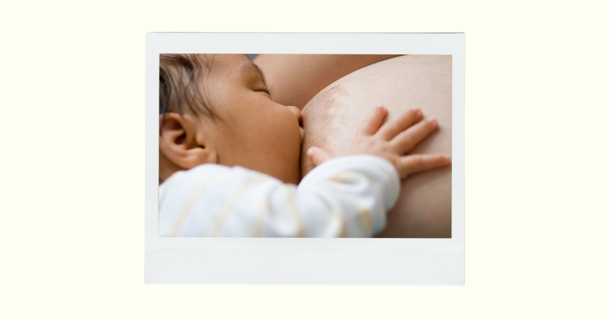 Closeup of woman breastfeeding a baby