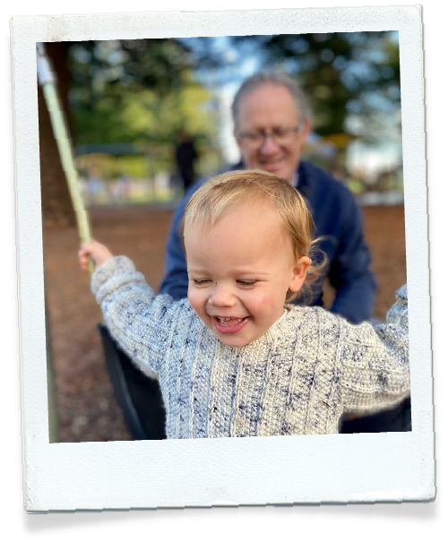 Dr Leon Levitt with his grandson at the park
